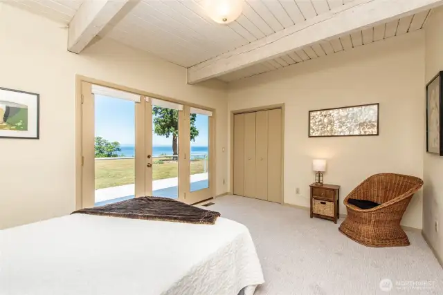 Wake up to water views and watch the deer play in the yard from bed in the primary bedroom!