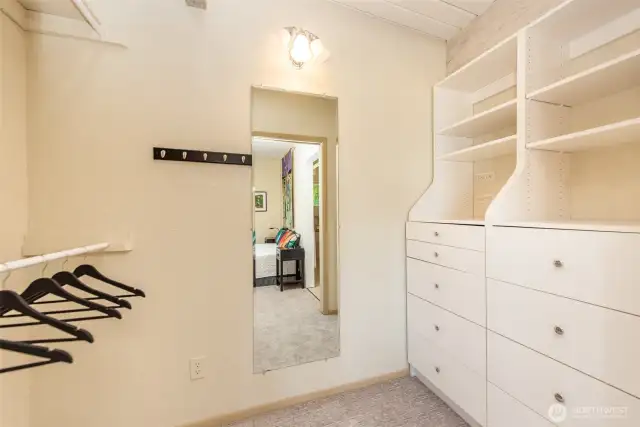 Built in storage in the primary walk-in closet