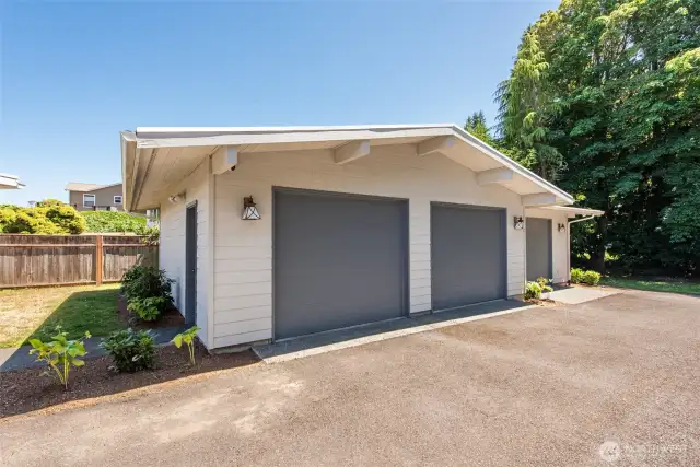 Detached 3 car oversize garage bays will give you room for the cars, or toys!