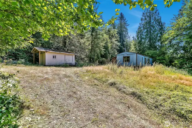 There are 2 sheds also on the property, this one at the top of the driveway is in decent condition, with power running to it.