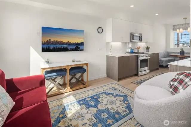 Open concept living space flowing seamlessly into kitchen.