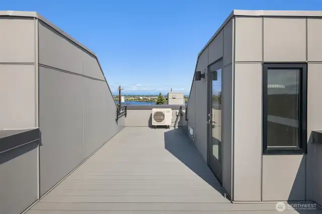 Private rooftop deck with views, perfect for entertainment.