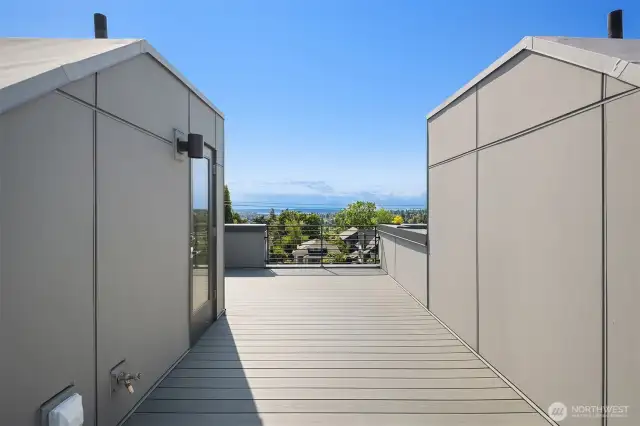 Rooftop deck with sweeping views complete with power, gas, and water.
