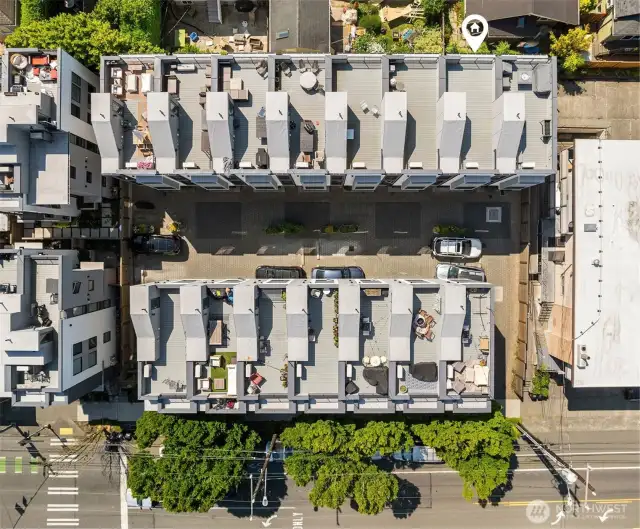 Top-down look at community layout and quiet paver drive.