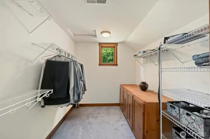 Primary walk in closet. Windows in every room of this home.  Wonderfully designed.