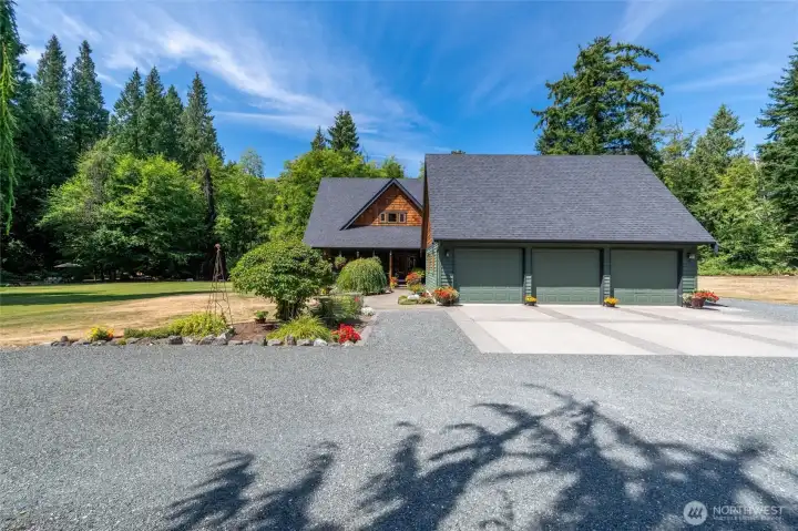 Tons of parking.  View to entry as you drive up to home. Beautifully landscaped. New roof in 2024.