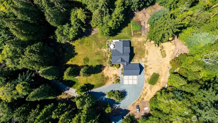 Entire five acres is fenced and gated.