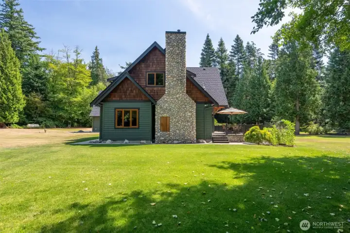 Storybook chimney is charming.  Home has new exterior paint and all cedar has been stained.