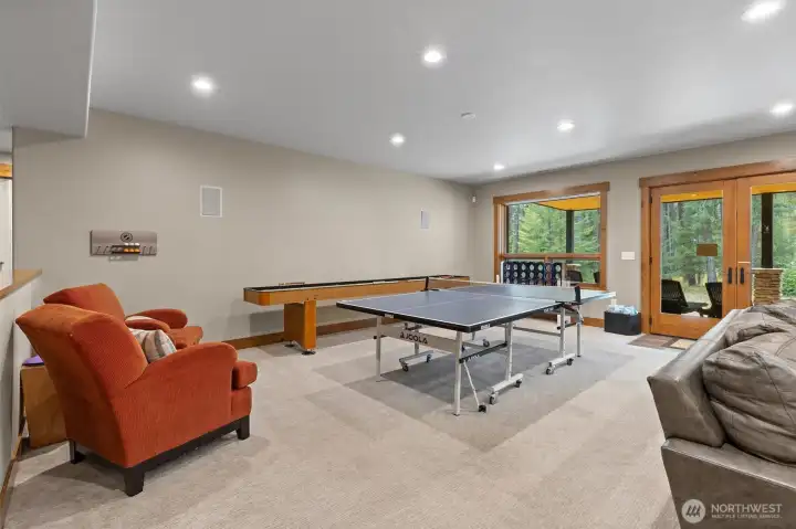 Basement rec room with games.