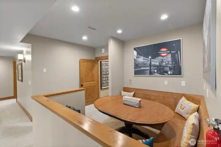Basement rec room seating area plumbed for kitchen