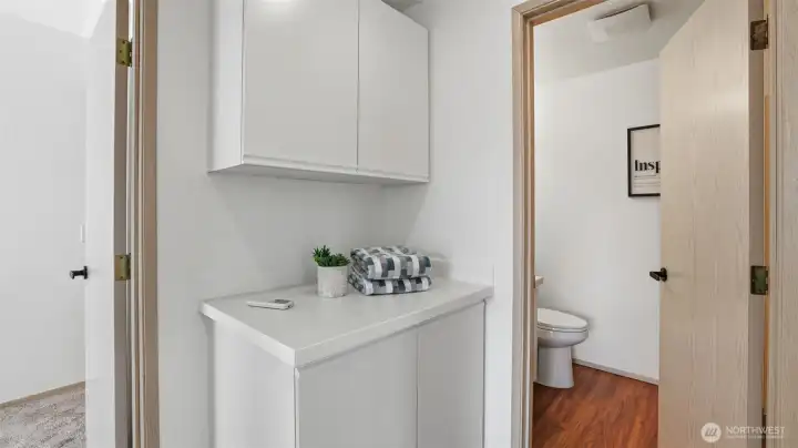 Stay organized with built-in cabinetry and a clean, minimal design.