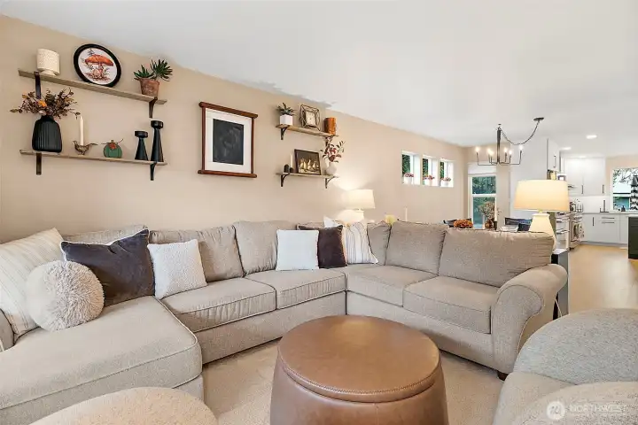 Spacious living room connects directly to the formal dining room for easy entertaining.