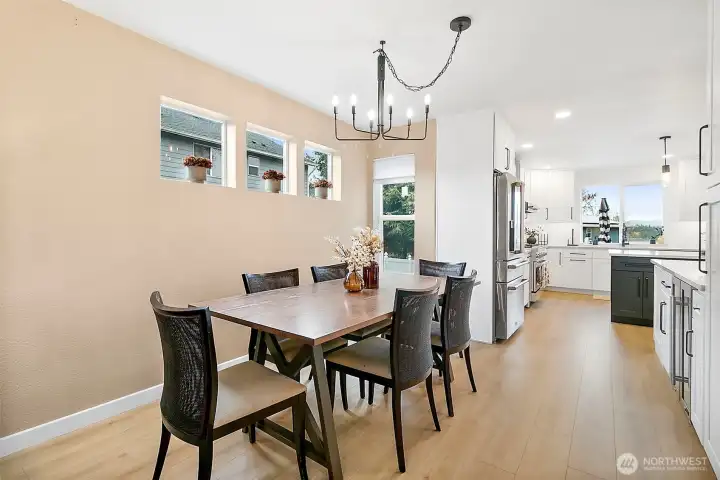 Formal dining area connects seamlessly to the kitchen through a custom butler's buffet.