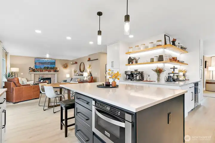 The open kitchen connects to the eating area & family room, ensuring plenty of room for meals & entertaining.