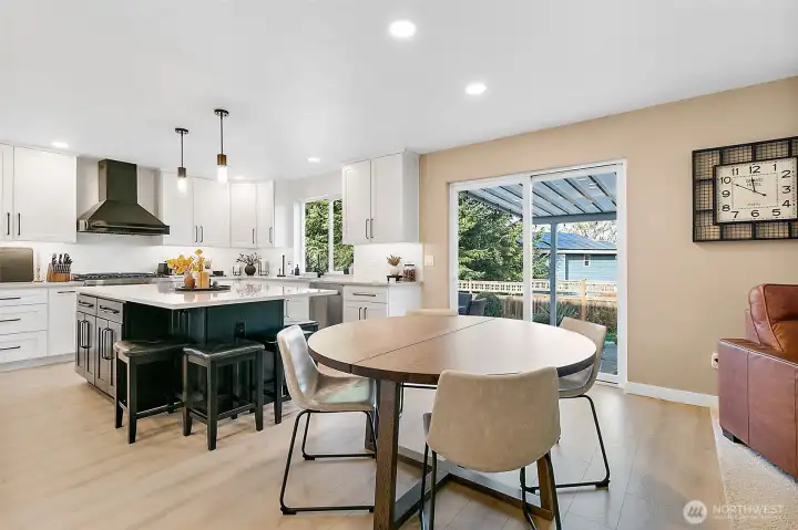 Large off kitchen eating space + island bar eating space!