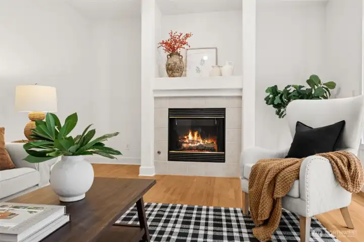 Fireside room has big windows and hardwoods