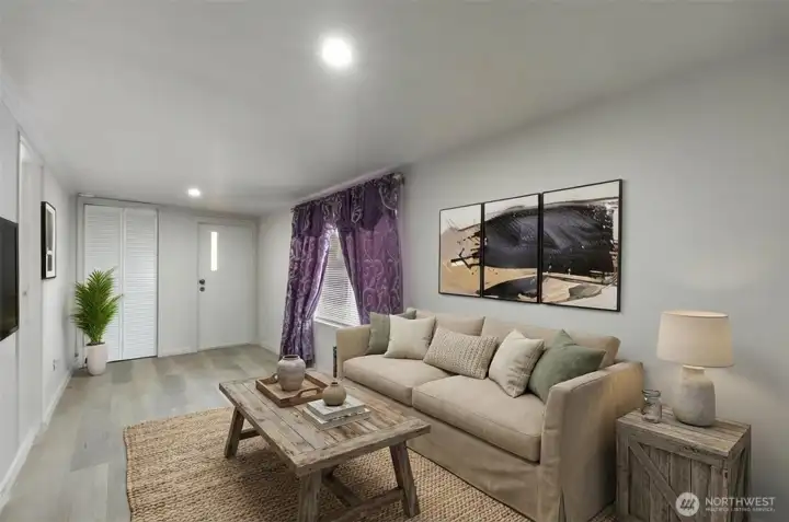 Entry & living room.   Virtually staged