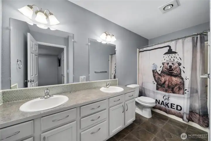 Primary Bedroom with double H/H sinks