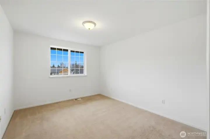 Bright bedroom perfect for guests or hobbies