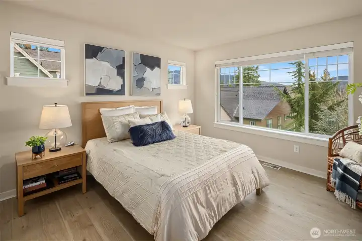 Two bedrooms on the upper level including a good size primary suite offering mountain vistas.