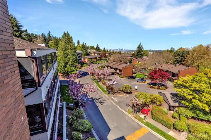 View from the unit overseeing the condo complex and golf course with downtown to the north.
