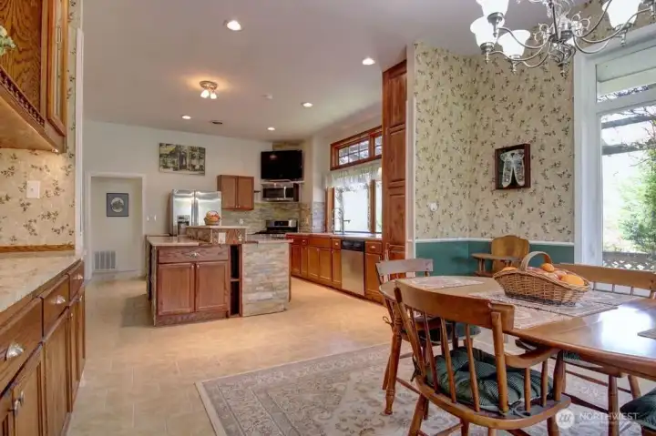 Dining room with built in oak cabinets.