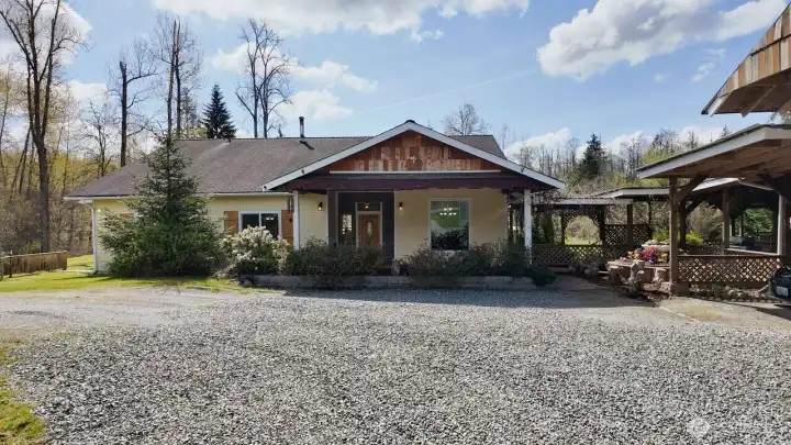 Front facing view of home with gazebo off to the right.