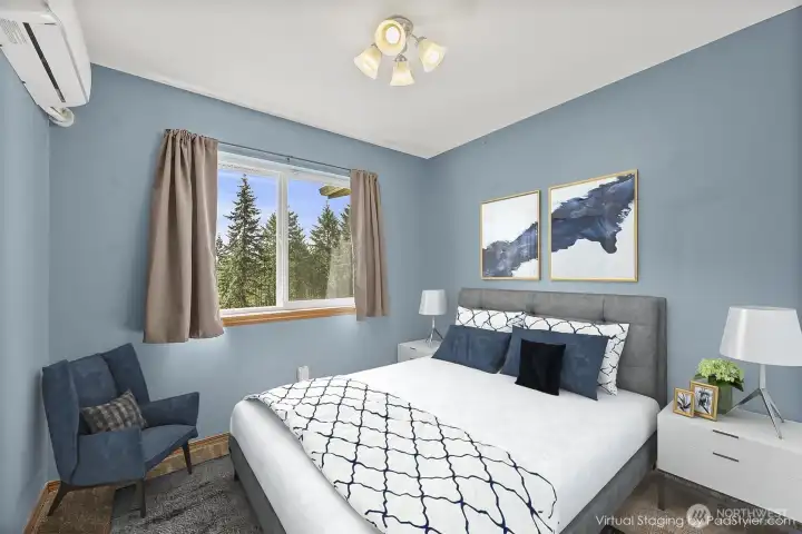 Virtually staged guest bedroom.