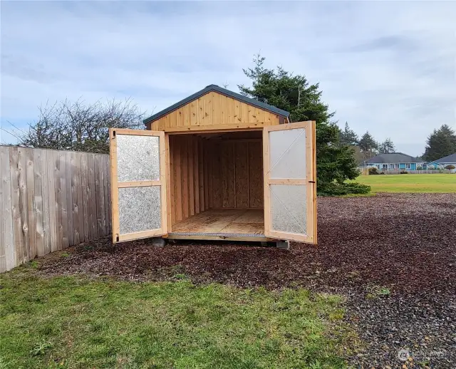 Brand new, $5,400 shed with green metal roof that matches the house. Also, the sellers have city approved plans for a garage on the property with a breezeway!