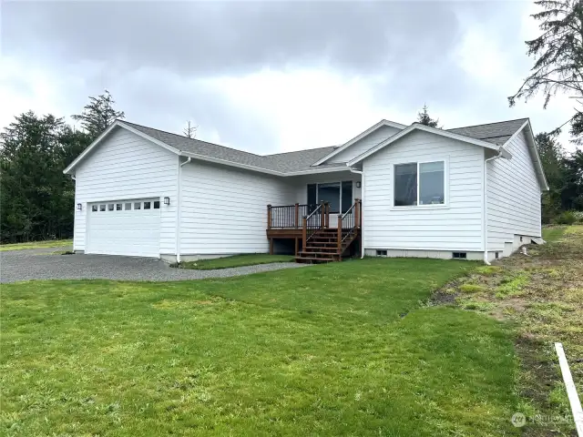 Front and back yards are newly planted grass.  Let's take a look inside.