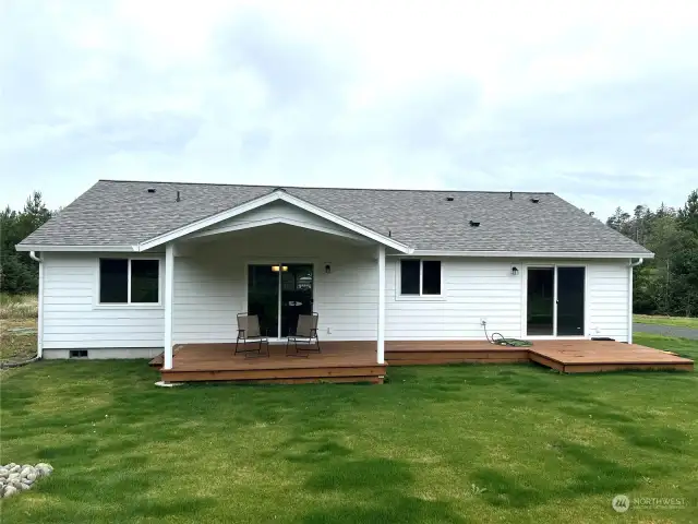 Facing west at the back of the house and lawn.