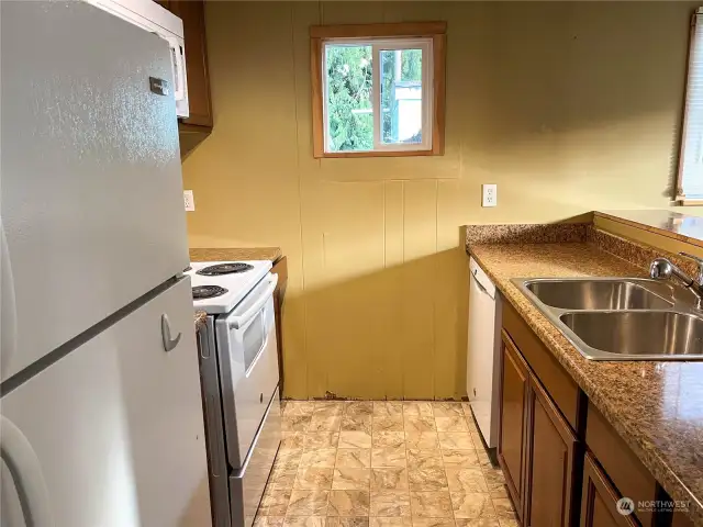 Kitchen overlooks dining room