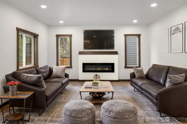 Virtually staged living room...cozy, warm and the electric fireplace actually has a remote to change the color of the flames