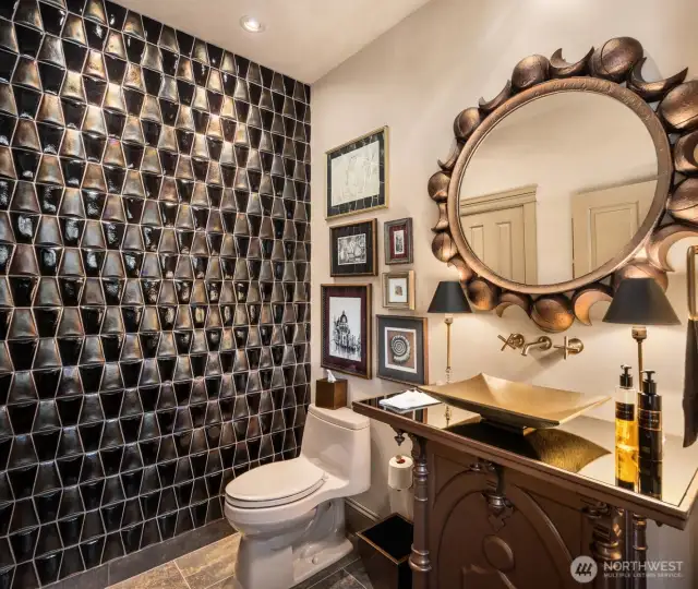 Handmade glass wall of tiles and custom mirror.