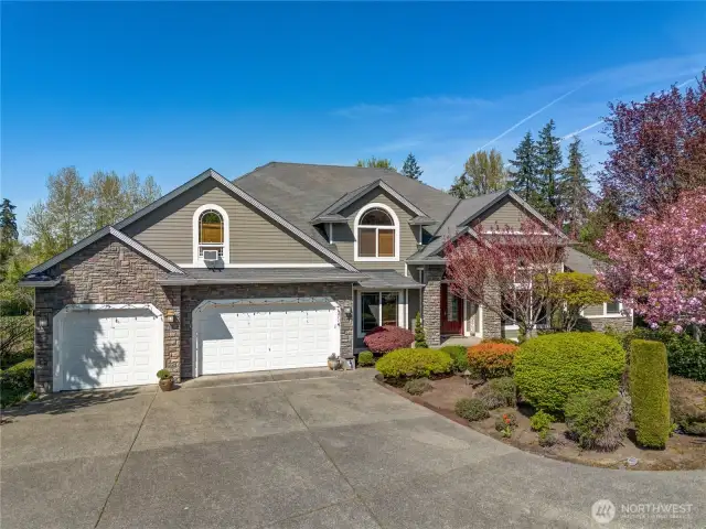 Welcome to Edgewood Estate, nestled on 1.3 acres of land. This residence offers ample space and privacy, situated at the end of a peaceful cul-de-sac. The three-car garage provides parking and storage. Recent updates include a central vacuum system and an updated air-conditioning unit.