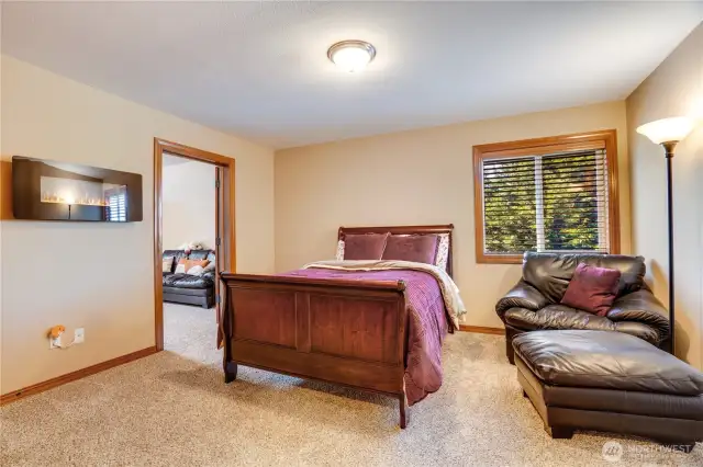 This fourth bedroom offers a private space to rest and relax.