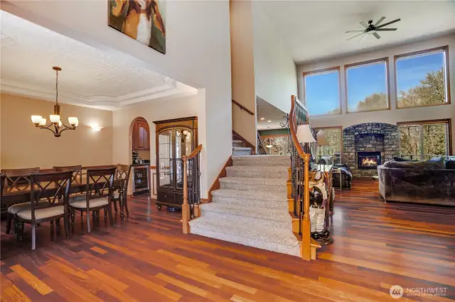Upon entering, the impressive two-story foyer and great room are anchored by the rich cherry hardwood floors and expansive windows.