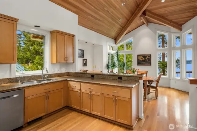 The chef deserves a view like this. This gourmet kitchen offers a built-in bar and is open to the living space for entertaining.