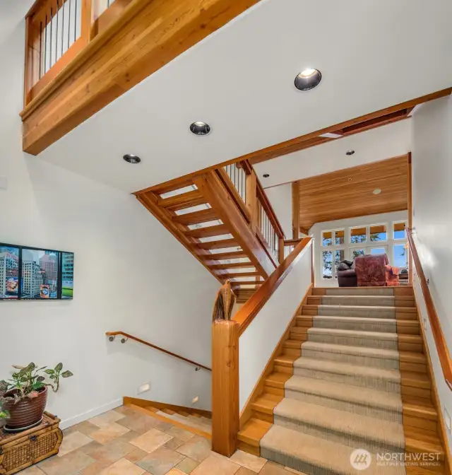 Stunning 3 level entrance with hand carved eagle banister.