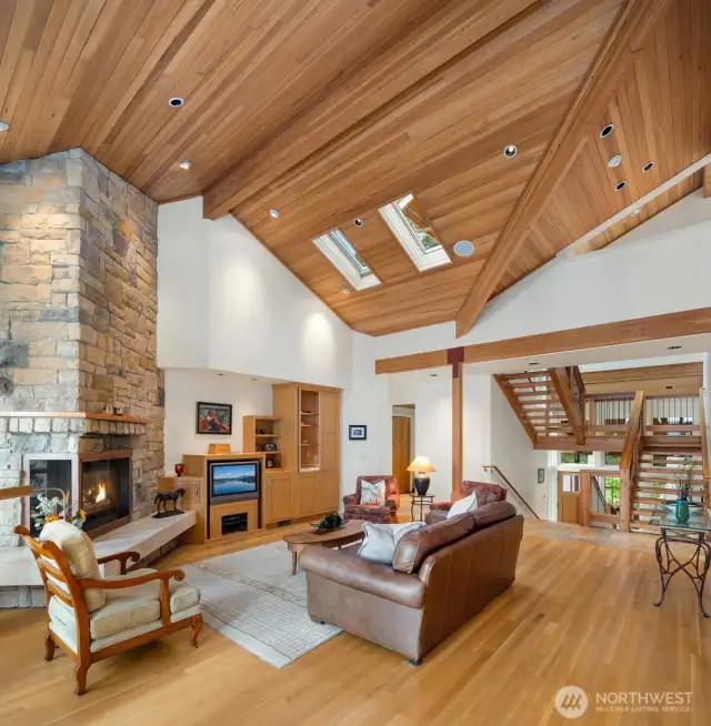 Museum like vaulted and beamed ceilings allow the light to soar throughout the home.