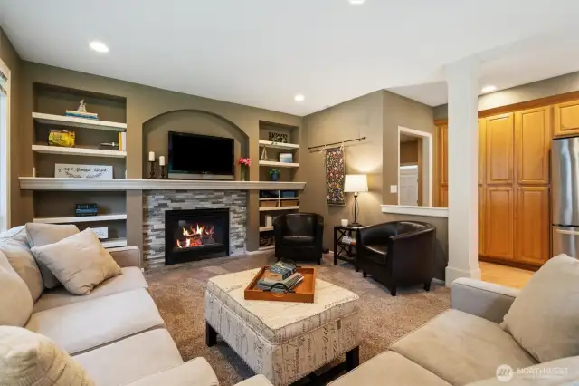 The Family Room + Kitchen serve as the perfect everyday living space.