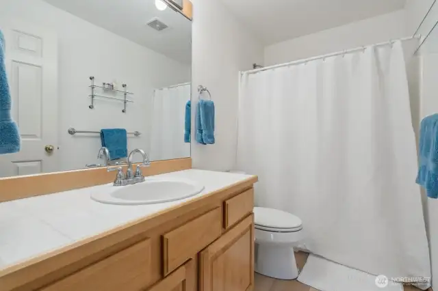 Full bathroom with easy access to bedrooms