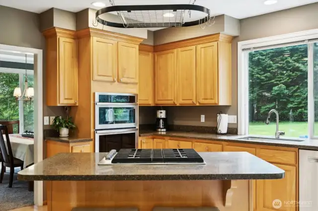 The kitchen island is the perfect breakfast nook to enjoy your morning coffee.