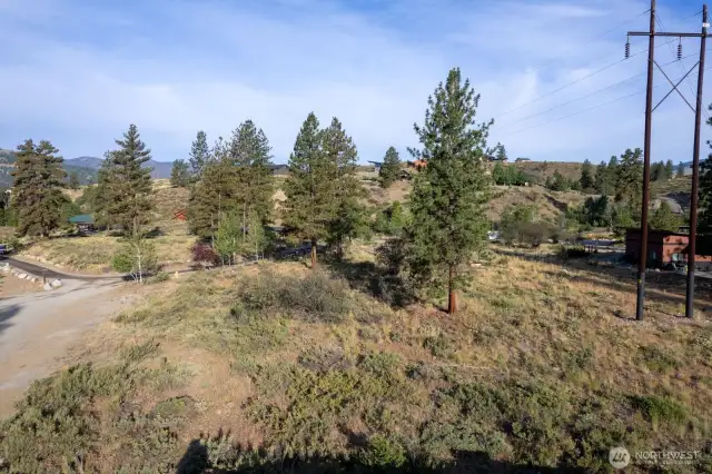 615 Pine Loop has community water and sewer hook-up. Power nearby.