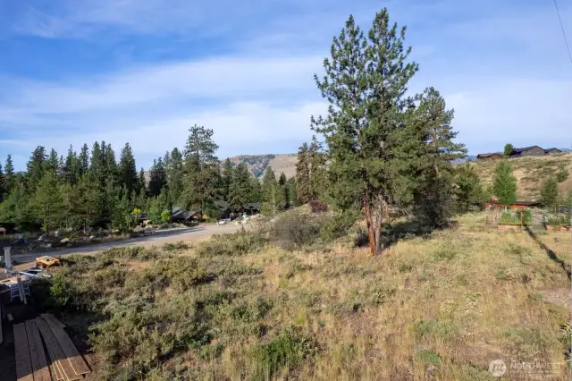 7,536 square foot Lot 25, has a great location in the community of North Village. Drive-in and drive-out on well maintained roads.