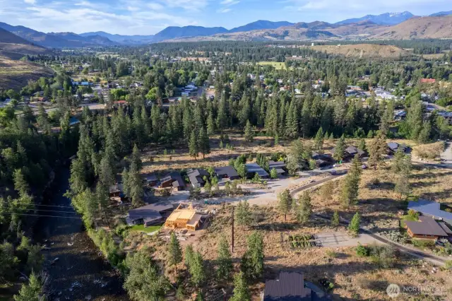 Lot 25 has a good location at 615 Pine Loop Winthrop's North Village.