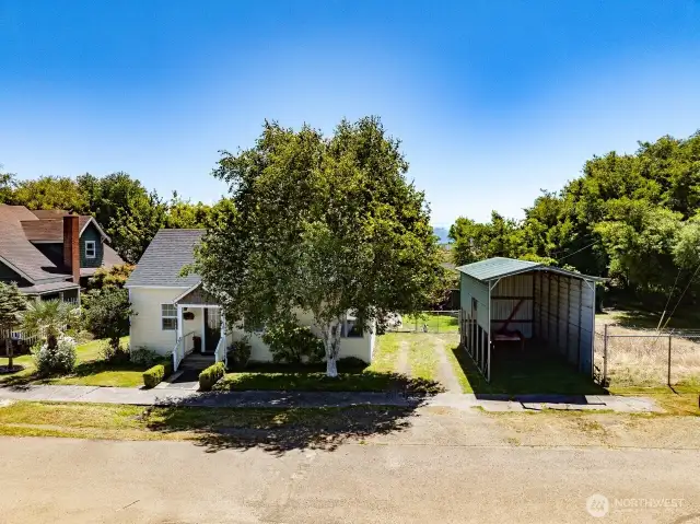 3 bedroom home in the heart of Ilwaco. Loving maintained since 1924. 2 car garage in the back and RV storage in the front.