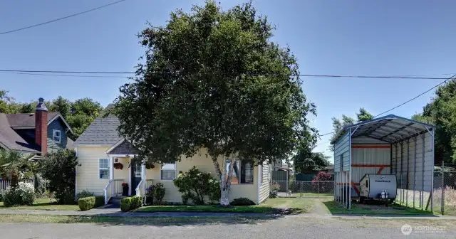 3 bedroom home in the heart of Ilwaco. Loving maintained since 1924. 2 car garage in the back and RV storage in the front.