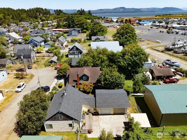 Ariel view looking at the back yard and 2 car garage.