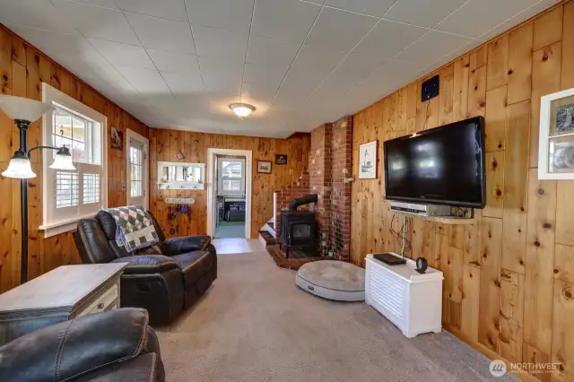 Looking into the living room and downstairs primary bedroom.